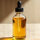 Jojoba oil in a glass bottle