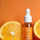 Vitamin C serum with orange slices